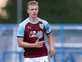 Burnley defender Mee signs three-year deal