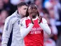 Arsenal's Eberechi Eze (right) leaves the pitch after going down injured during the Premier League match at the Emirates Stadium, London. Picture date: Saturday April 25, 2026.