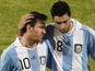 Argentina teammates Lionel Messi and Javier Pastore leave the pitch after beating Costa Rica on July 11, 2011