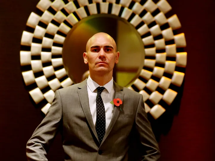 Hall retains title after technical draw