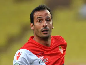 Giuly on bench