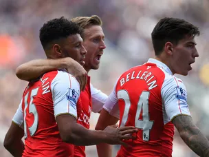 Arsenal battle past 10-man Newcastle