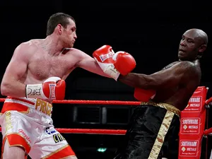 David Price throws a punch at Matt Skelton on December 1, 2012