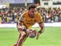 Darnell McIntosh scores a try for Castleford Tigers during a Super League game.