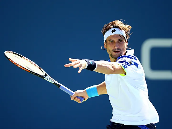 Ferrer safely through to second round