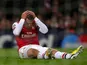 Lukas Podolski on the ground after missing a chance for Arsenal on November 21, 2012