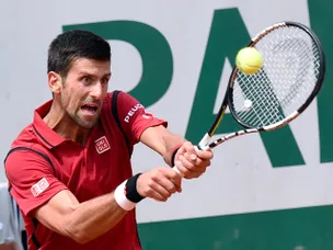 Djokovic eases past Darcis in second round