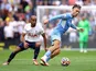 Manchester City's Jack Grealish in action with Tottenham Hotspur's Lucas Moura in the Premier League on August 15, 2021