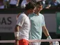 Spain's Rafael Nadal and Serbia's Novak Djokovic hug after their semifinal match of the French Open tennis tournament on June 7, 2013