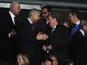 Arsene Wenger having a laugh in the stands with Roy Hodgson