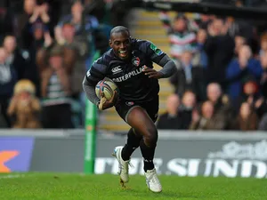 Leicester Tigers' Miles Benjamin runs in to score a try against Montpellier during their Heineken Cup match on December 8, 2013
