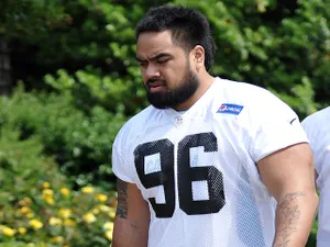 Star Lotulelei of the Carolina Panthers walks toward the team's practice facility during the Panthers Rookie Camp on May 10, 2013