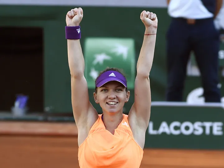 Halep ousts Petkovic to reach final