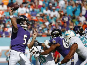 Ravens too strong for Dolphins