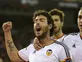 Valencia score three to see off Malaga