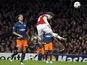 Laurent Koscielny takes a header which hits the crossbar on November 21, 2012