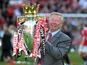 Manchester United manager Sir Alex Ferguson with the Premier League trophy in 2011