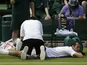 Radek Stepanek Czech Republic receives treatment as he plays Jerzy Janowicz of Poland in their Men's second round singles match on June 26, 2013