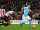 In-form Aguero earns City the points