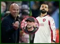 Jurgen Klopp, Arne Slot and Mohamed Salah of Liverpool