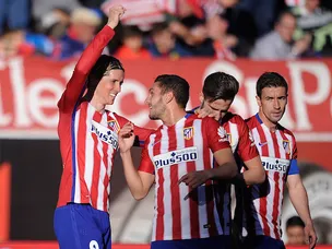 Atletico move level with Barcelona