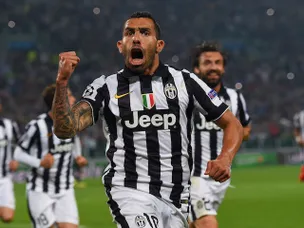 Evra: Carlos Tevez is a "champion"