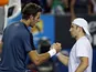 Juan Martin Del Potro shakes hands with Benjamin Becker following their second round match on January 17, 2013