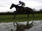 A waterlogged race track being ridden over by Pardini on December 11, 2006