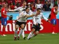 Germany's Philipp Lahm (R) celebrates his goal against Costa Rica with team mates Torsten Frings (C) and Bastian Schweinsteiger during their Group A World Cup 2006 soccer match in Munich June 9, 2006