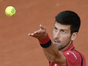 Djokovic cruises into round two