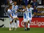 Leganes players celebrate after scoring against Barcelona on September 26, 2018