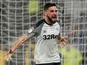 Graeme Shinnie celebrates scoring for Derby County on October 23, 2019