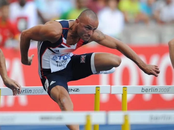 Turner wins 110m hurdles heat