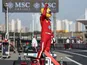 Ferrari driver Lewis Hamilton celebrates Chinese Grand Prix Sprint pole in March 2025.