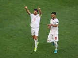 Alireza Jahanbakhsh and Mohammad Mohebbi celebrate the winning goal for Iran against Japan at the 2023 Asian Cup
