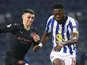 Manchester City's Phil Foden and Porto's Chancel Mbemba pictured on December 1, 2020