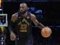 Los Angeles Lakers forward LeBron James dribbles the ball