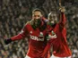 Jonathan de Guzman is congratulated by team mate Nathan Dyer after scoring his team's second goal on December 29, 2012