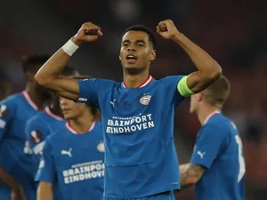 Cody Gakpo celebrates scoring for PSV on October 6, 2022