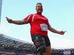 Aled Davies takes shot put gold