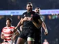 Joe Cokanasiga celebrates scoring for England against Japan on November 17, 2018
