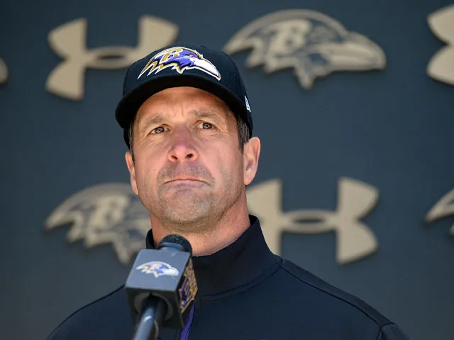 Harbaugh denies 'deflategate' involvement