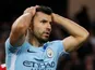 Manchester City's Sergio Aguero reacts after a missed chance against Manchester United on April 7, 2018