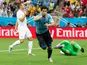 Uruguay's Luis Suarez celebrates scoring against England on June 19, 2014