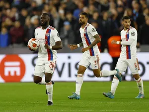 Lyon's Tanguy Ndombele celebrates scoring their first goal on April 7, 2022