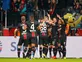 Bayer Leverkusen fight back to end Bayern Munich's winning run