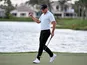 Keith Mitchell reacts after making a birdie putt on the 18th green during the final round of The Honda Classic golf tournament at PGA National on March 4, 2019