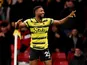 Watford's Emmanuel Dennis celebrates scoring their first goal on December 28, 2021