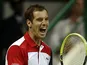 Richard Gasquet celebrates his win over Daniel Brands in the Qatar Open on January 4, 2013