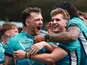 Hull FC celebrate scoring a try during a Super League clash.